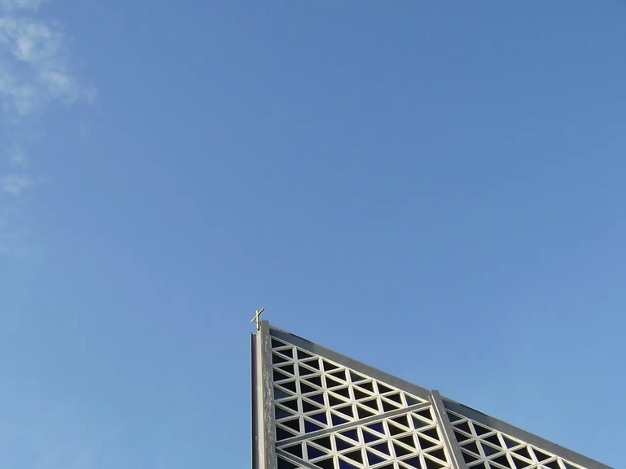 In this picture we can observe a large advertising board. We can observe a sky in the background.