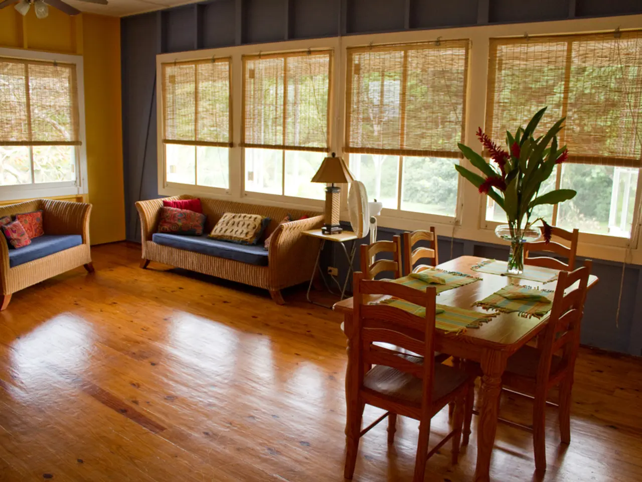 In the picture we can find a house interior, inside the house we can find two sofas, one dining...