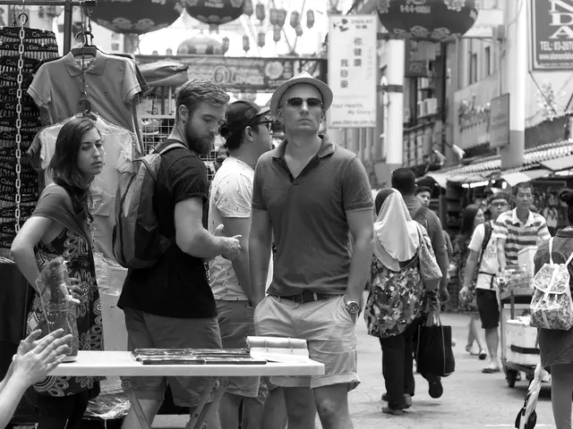 Law enforcement officials storm Hybe Corporation's headquarters, investigating CEO Bang Si-hyuk for...