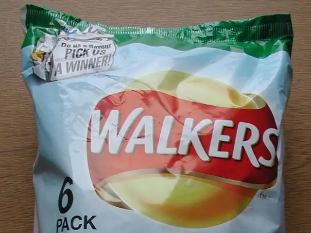 This image consists of a snacks packet kept on the desk.