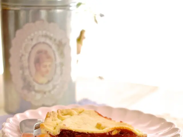 In this picture we can see plates, food, spoon, knife, cloth and objects on the platform. In the...