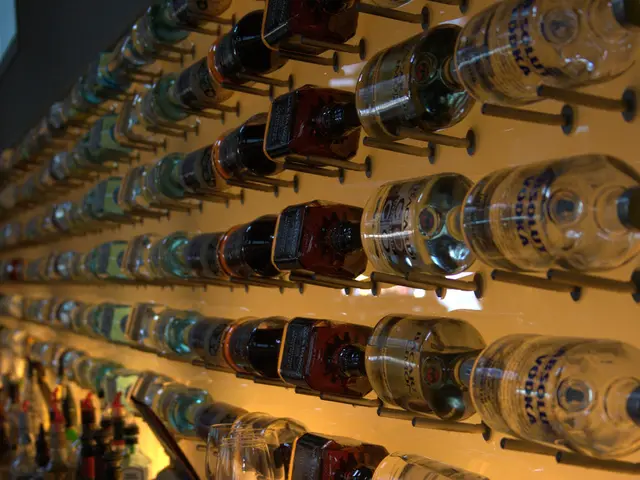 As we can see in the image, there are lot of bottles arranged in a sequence.