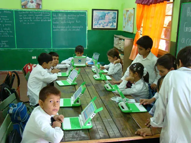 In this picture all this children are wearing school dress and operating computers and this is...